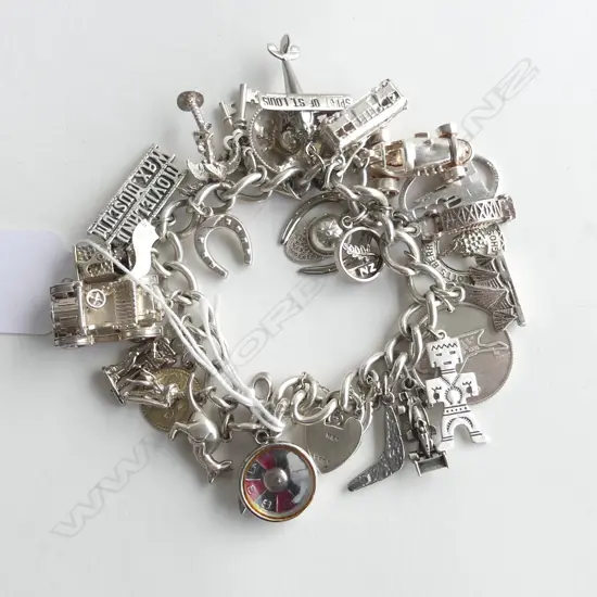 HEAVY LOADED SILVER CHARM BRACELET 102gms