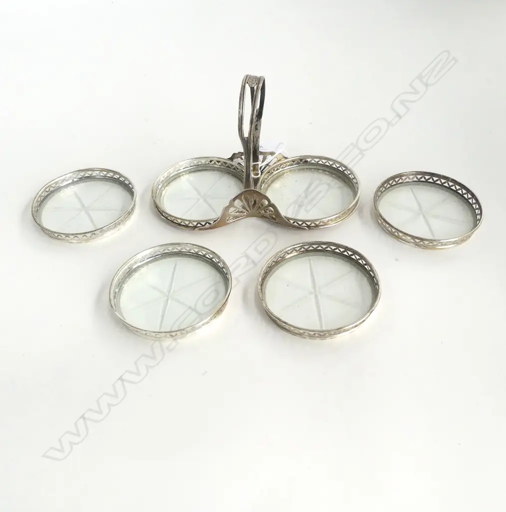 6 STG SILVER COASTERS & STAND loop handle pulled away at one fixing at the base Image 1++