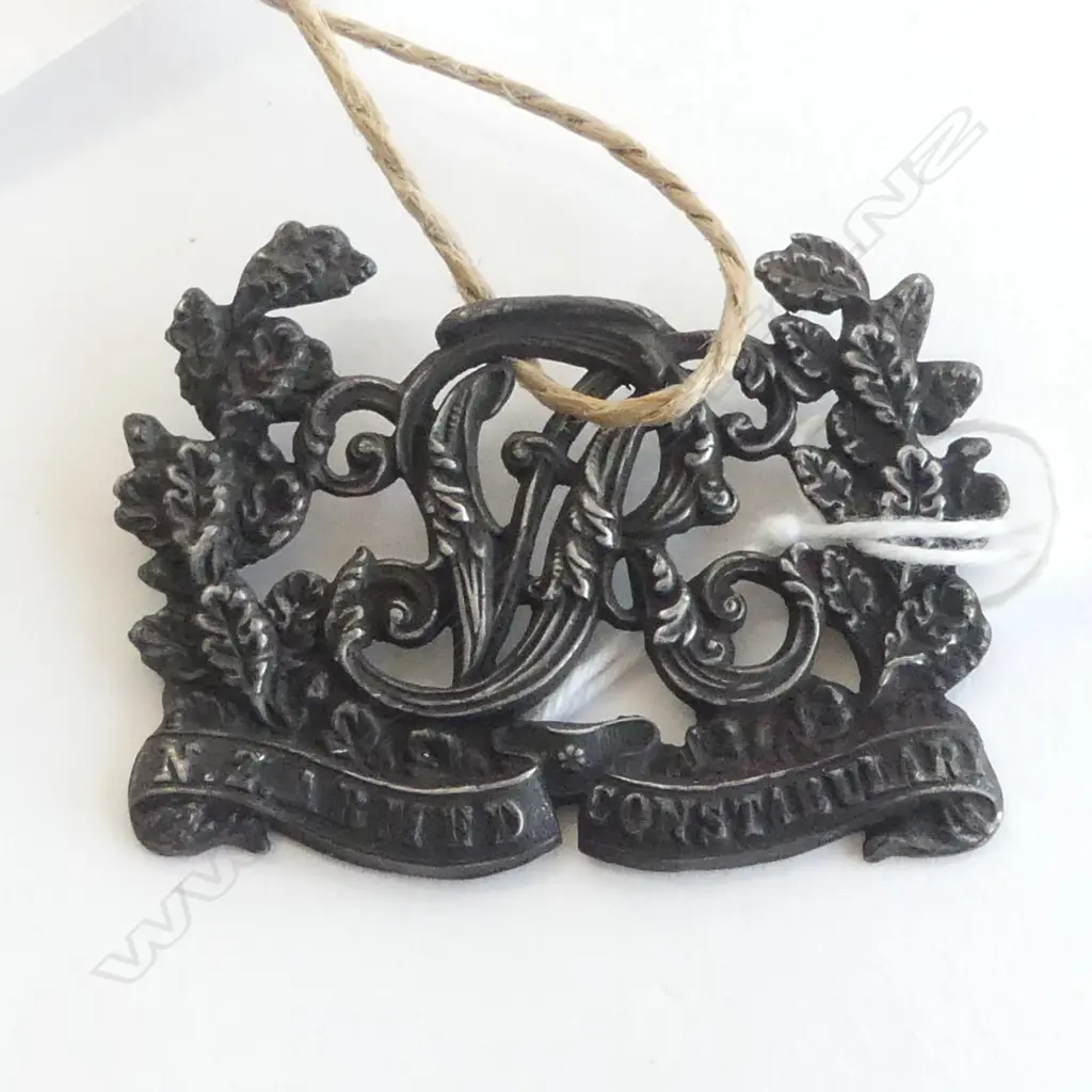 SILVER ARMED CONSTABULARY CAP BADGE 1866-1872 'VR'. missing crown. Image 1++