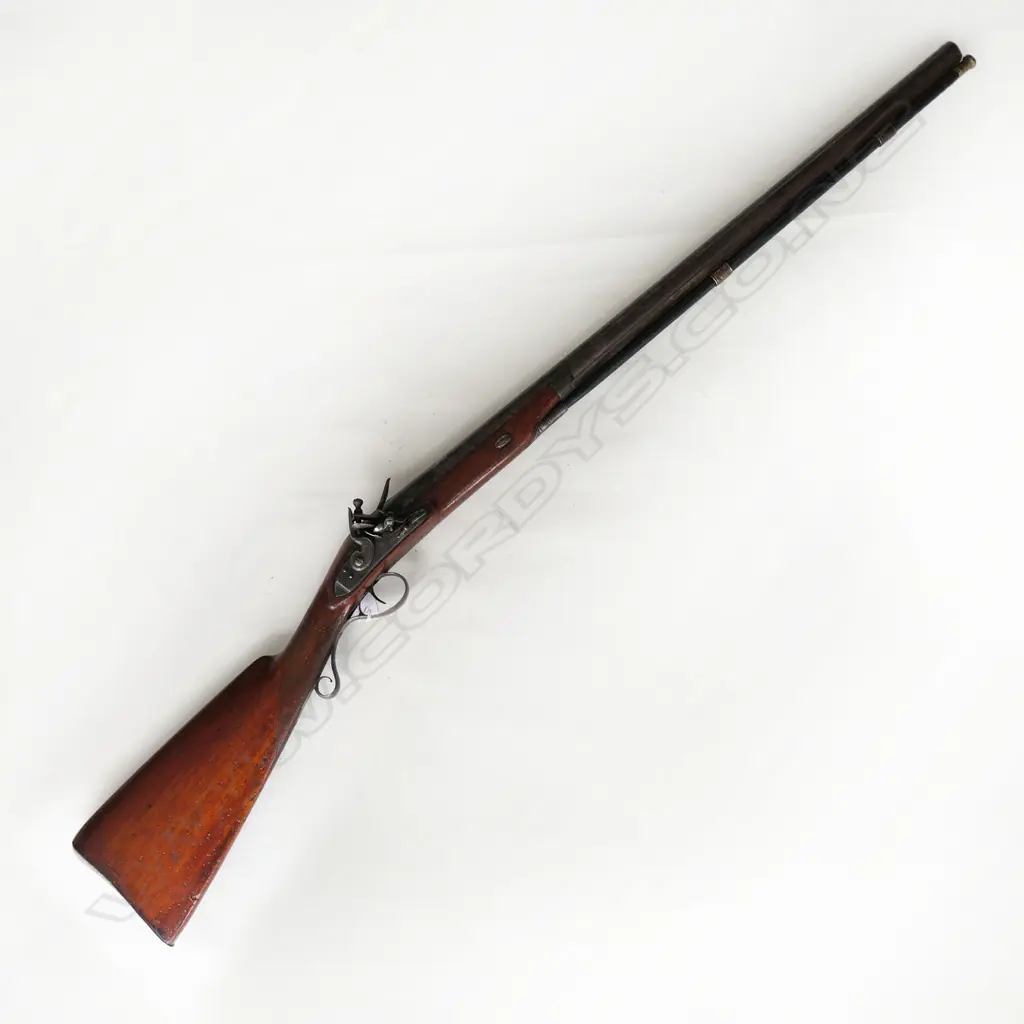 11 bore English flintlock muzzle loading single barrel gun,  lock marked 'Francis', walnut stock with filled worm holes, 30" twist barrel with single wedge to forewood, complete with ramrod. Steel trigger guard with rear scrolled tang. Overall 47". *NO LICENCE REQUIRED Image 1++