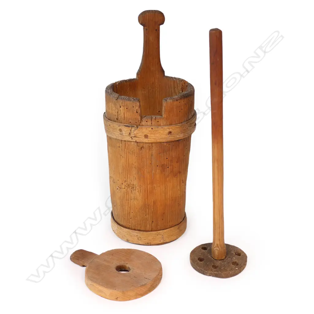 A 19thC Austrian/German turned and carved wood small butter churn mildly tapered cylindrical form the fitted lid supporting the plunger. Pinned bound strapping. H.350mm. Image 1++