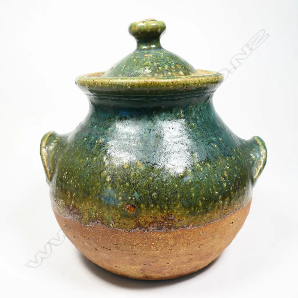 Andrew Van der Putten lidded storage vessel green glaze to the lid and top half of the body. pair of lug handles. Lid repaired, Image 1++