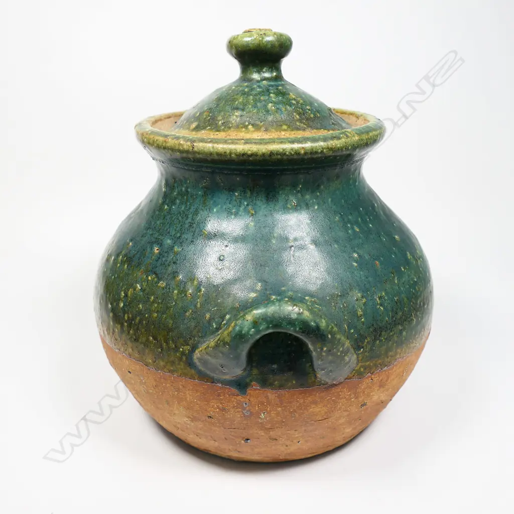 Andrew Van der Putten lidded storage vessel green glaze to the lid and top half of the body. pair of lug handles. Lid repaired, Image 1++