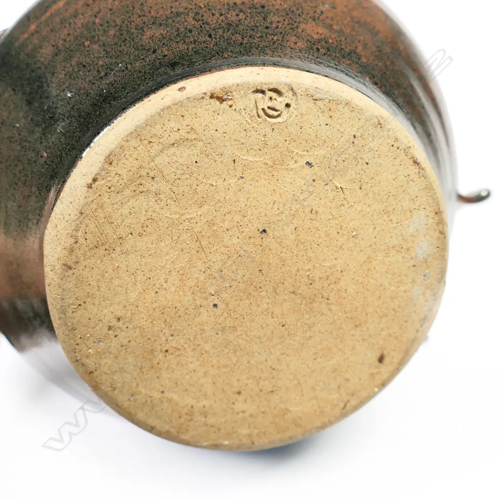 A Richard Cadness lidded casserole pot with two semi-circular handles to the body. Stamped to base. H.200mm Image 1++
