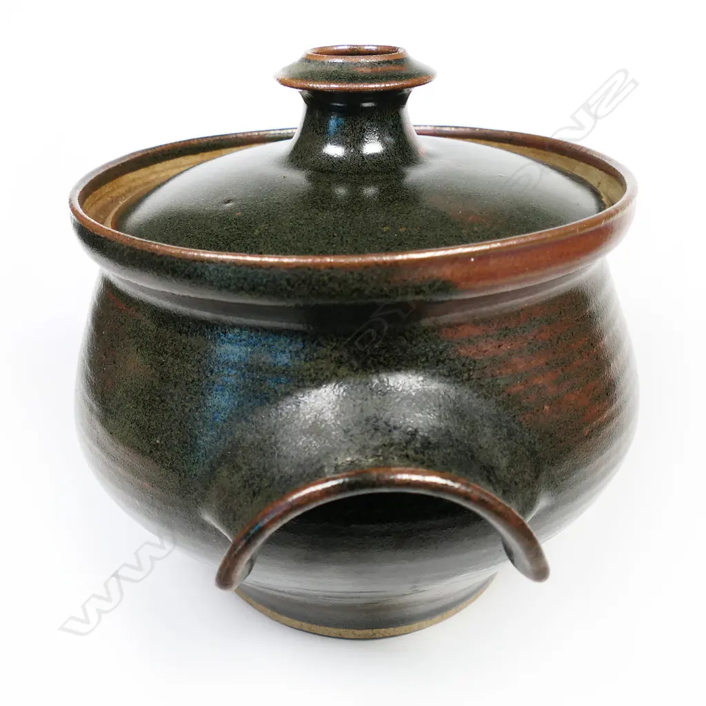 A Richard Cadness lidded casserole pot with two semi-circular handles to the body. Stamped to base. H.200mm Image 1++
