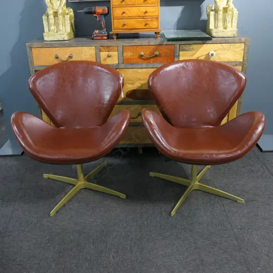 PR BROWN VINYL SWAN STYLE CHAIRS