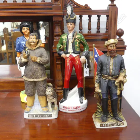 4 DECANTERS; FIJI, J.E.B. STUART, ROBERT PEARY (AF), IRISH MIST SOLDIER H.430mm