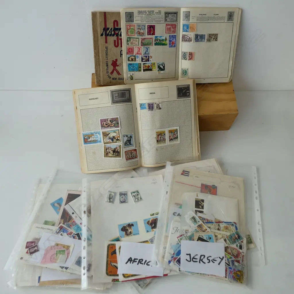 ASST. STAMP ALBUMS Image 1++