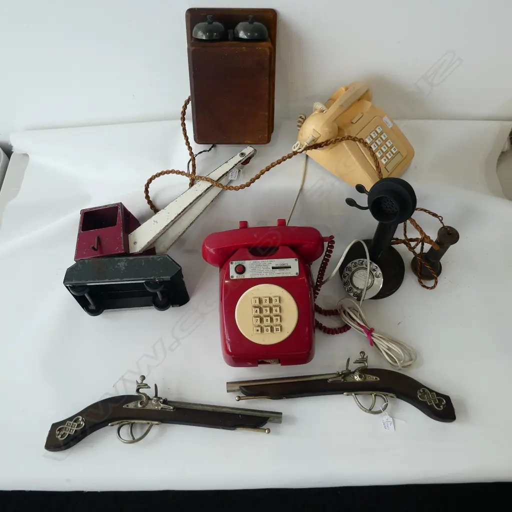 3 DIAL PHONES, 2 PISTOLS, TOY METAL CRANE Image 1++
