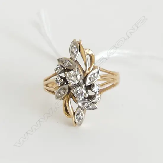 18CT FREE FORM DIAMOND RING 4.7 GRAMS...