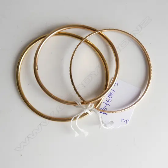 3 GOLD BANGLES. 2 x 14ct + 1 x 18ct. 23gms
