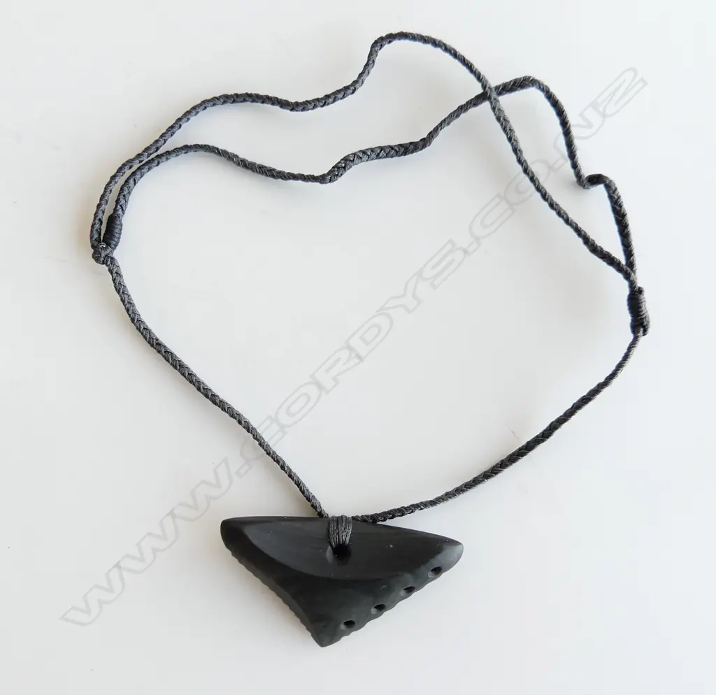 ROSS McCABE carved pounamu (gem obsidian mata)  rei niho tapu (sacred whale tooth) pendant with certificate 2017. L 70m Image 1++