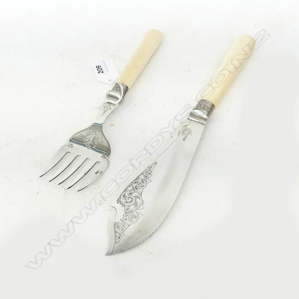 PAIR ANTIQUE IVORY & SILVER PLATE FISH SERVERS BY JAMES DIXON & SONS SHEFFIELD (NB: CRACK TO ONE HANDLE), L.315mm Image 1++