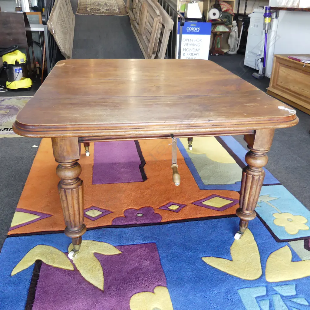 VICTORIAN MAHOGANY EXTENSION DINING TABLE ON CERAMIC CASTORS + CRANK 1400x1180mm Image 1++