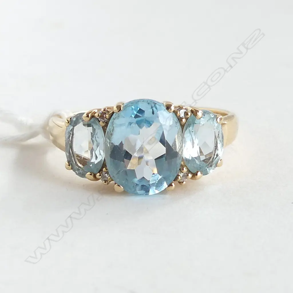 9CT BLUE TOPAZ & SMALL DIAMOND RING 4.4gms SIZE V Image 1++