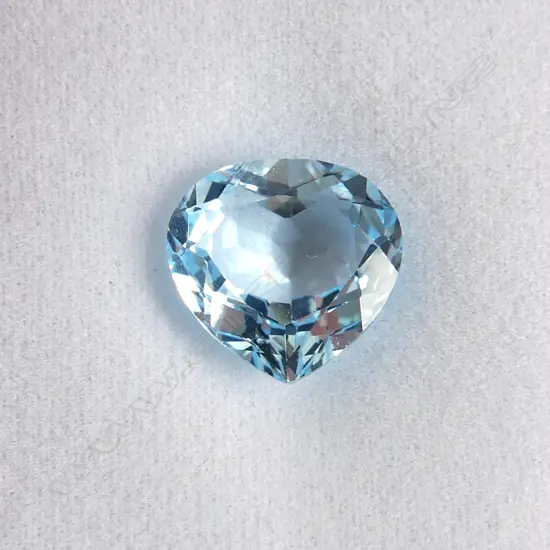 PEAR CUT BLUE TOPAZ 6.61cts AIG REPORT