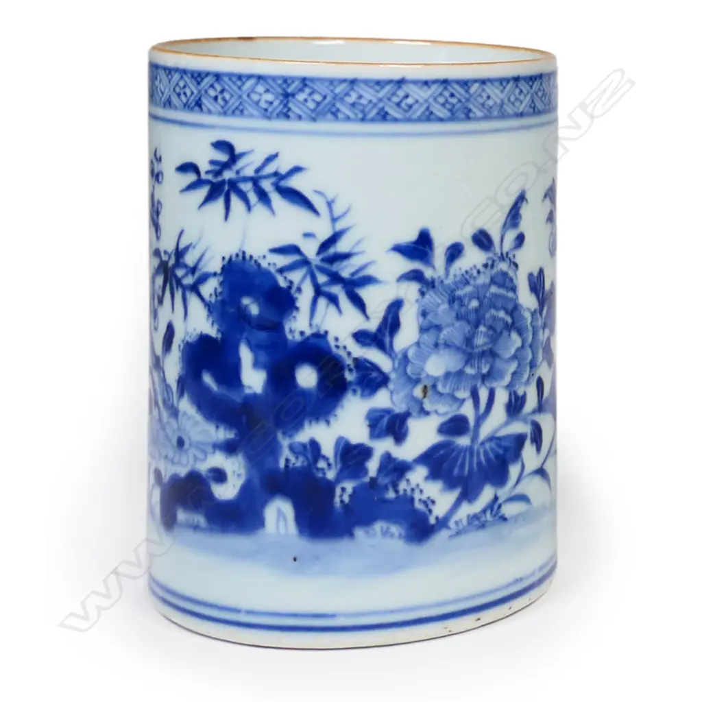 An 18th/19thC Chinese export mug blue and white floral decoration glaze fritting to handle. H.123mm.The handle professionally restored. Image 1++
