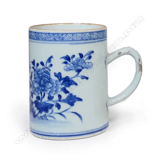 An 18th/19thC Chinese export mug blue and white floral decoration glaze fritting to handle. H.123mm.The handle professionally restored.