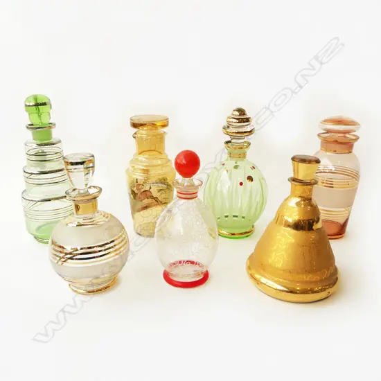 7 VINTAGE DECANTERS H.250mm