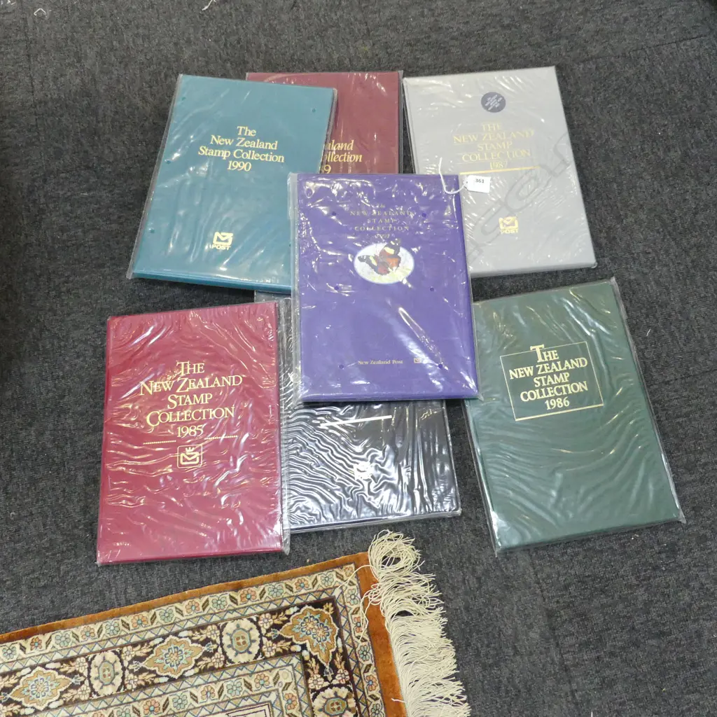 7 NZ STAMP COLLECTION FOLDERS 1985-1991 Image 1++