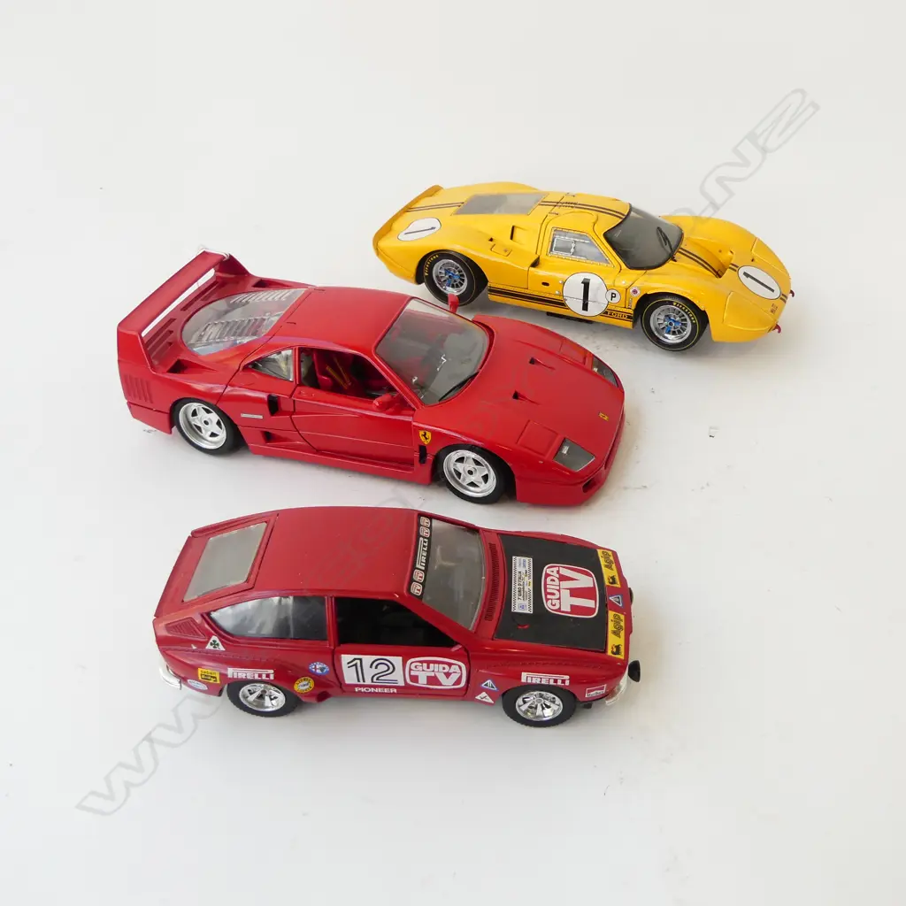 3 MODEL CARS; EXOTO FORD MKIV, BURAGO FERRARI F40 & ALFETTA CORSA Image 1++