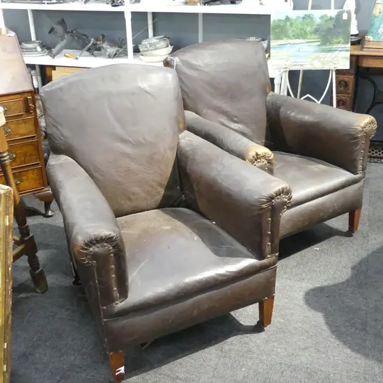 PR BROWN VINYL CLUB CHAIRS