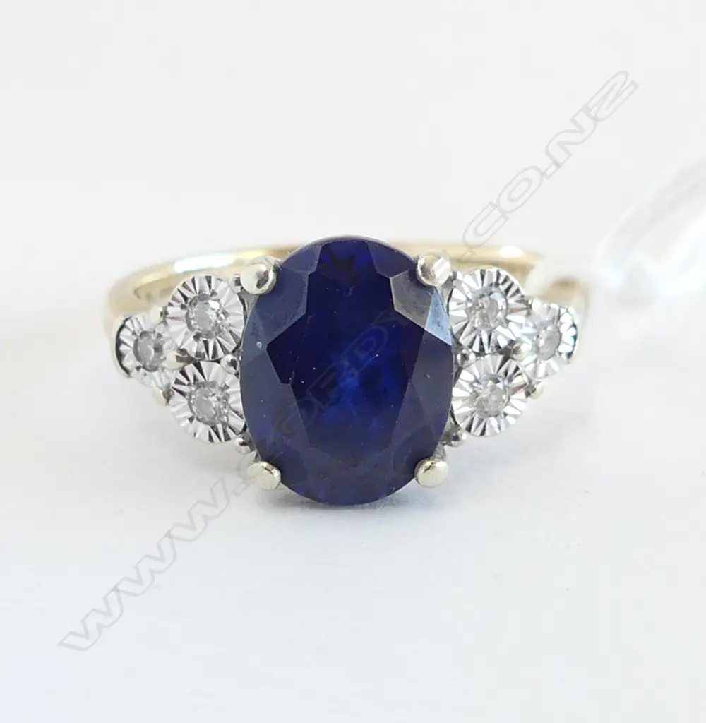 10ct Y/GOLD DIAMOND & FAUX LGE SAPPHIRE RING 3.3gms SIZE N 1/2 Image 1++