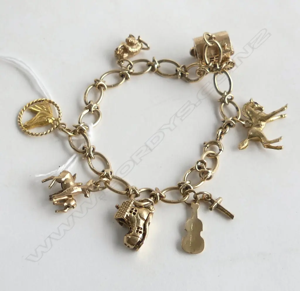 9CT CHARM BRACELET, 25gms Image 1++