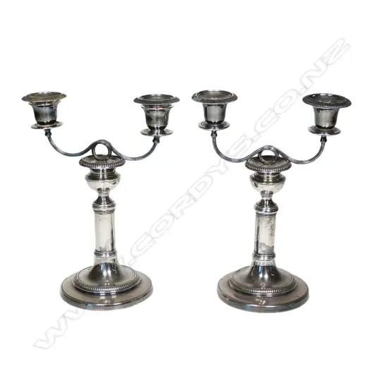A pair of early Victorian 1855 silver candelabra 938gms,