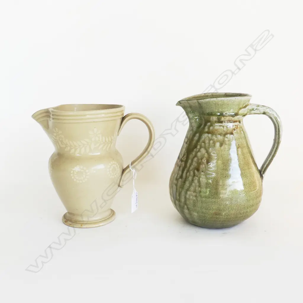 2 POTTERY JUGS; ROYAL DOULTON H.180mm, OTHER GREEN GLAZED Image 1++
