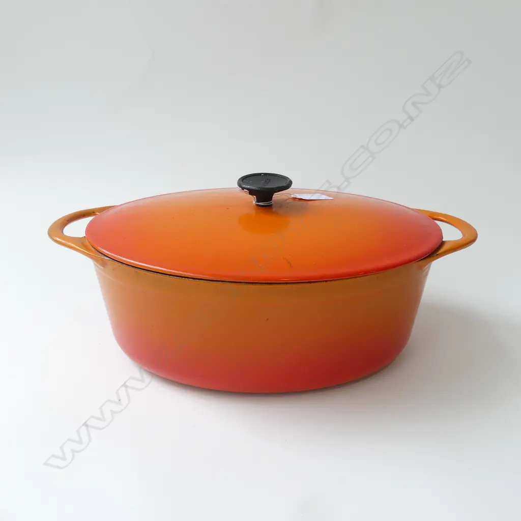 COUSANCES FRENCH ORANGE ENAMELLED CAST IRON LIDDED OVAL CASSEROLE W.360mm some wear Image 1++