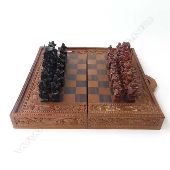 BALINESE WOODEN CHESS SET HAND CARVED 32PC WITH FOLDING BOARD, SEE LABEL,  L.40MM