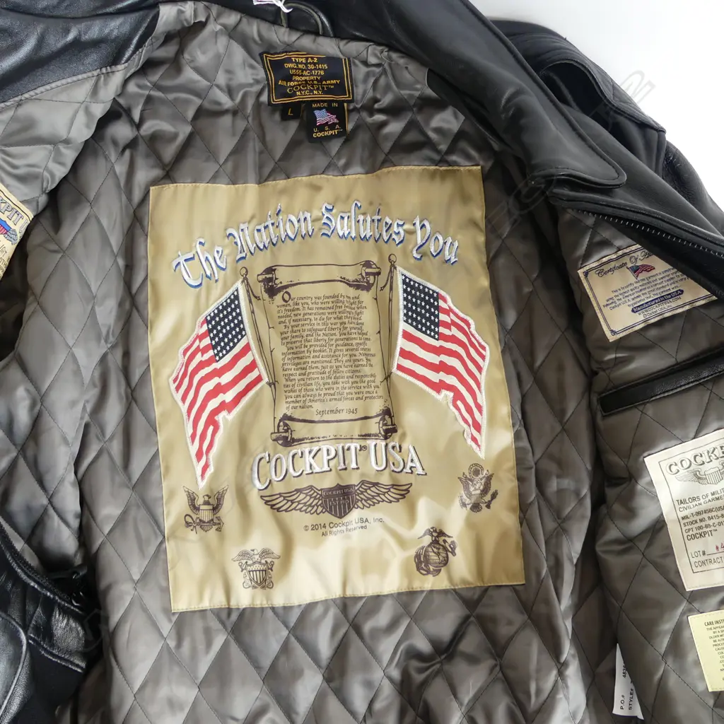 USA 'COCKPIT' black LEATHER 'AIR FORSE U.S.,ARMY' JACKET large. Details to quilted lining Image 1++