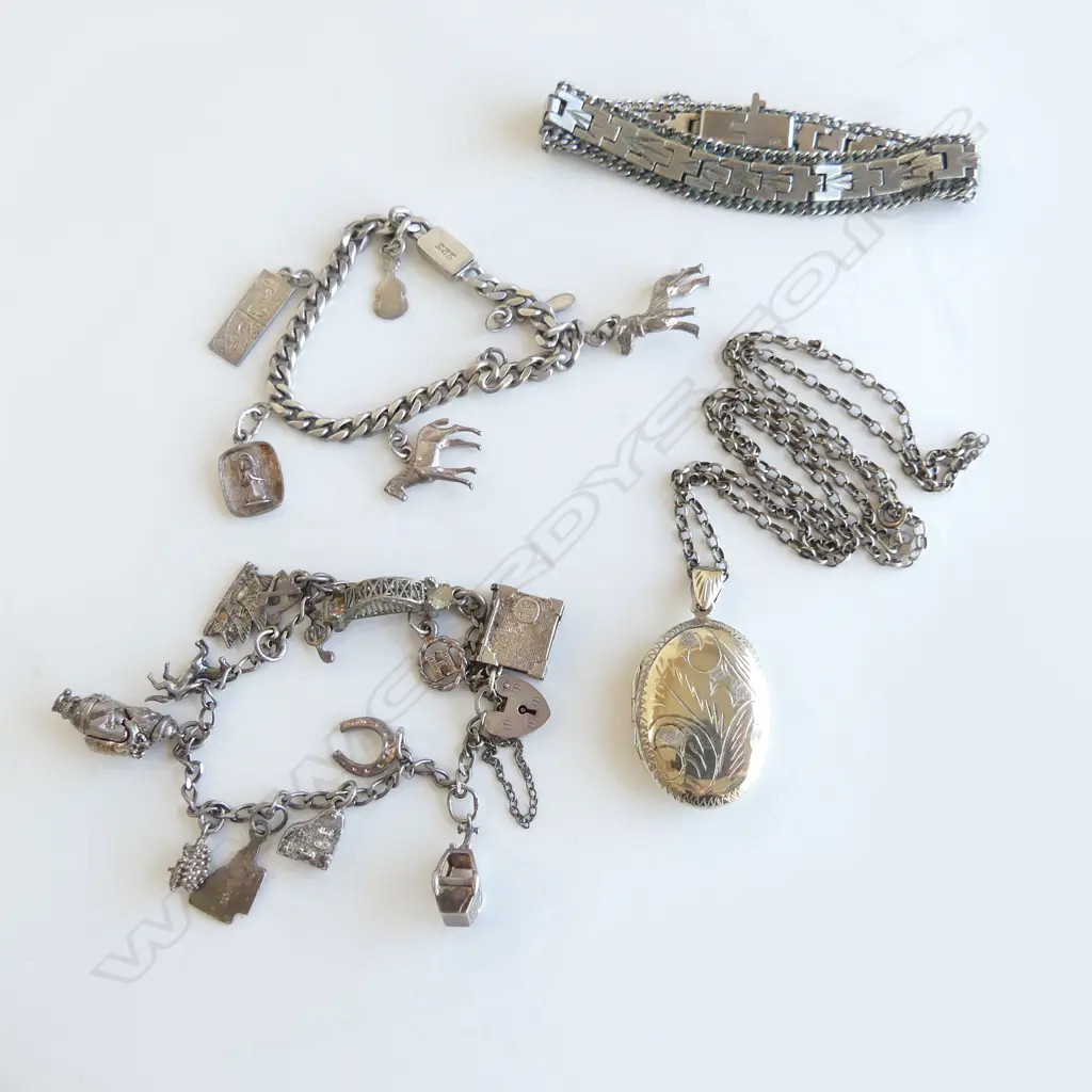 4 SILVER ITEMS; BRACELET, 2 SILVER CHARM BRACELETS & SILVER CHAIN & LOCKET 90gm Image 1++