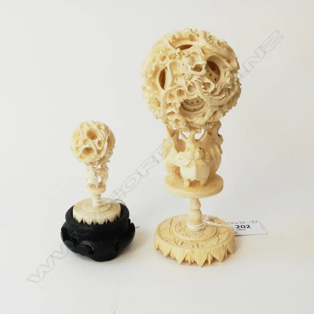 2 CARVED IVORY PUZZLE BALLS HELD HIGH BY ELEPHANTS ON CARVED IVORY STANDS H.100/150mm Image 1++