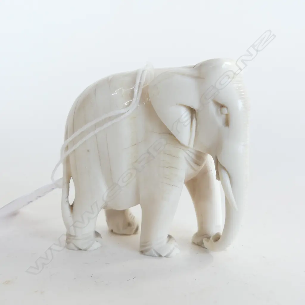 SMALL CARVED IVORY ELEPHANT H.53mm. 1 tusk absent Image 1++