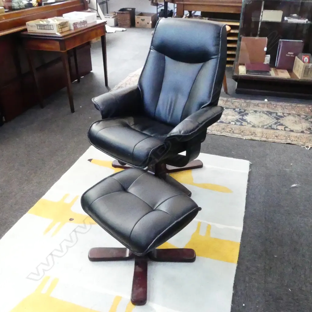 BLACK VINYL RECLINING CHAIR & FOOTSTOOL Image 1++