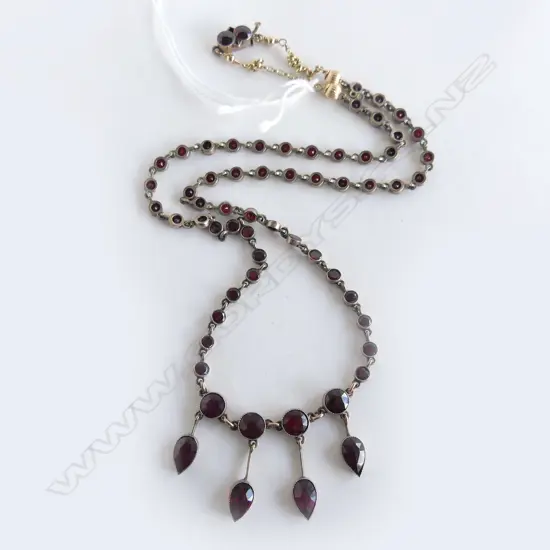 EDWARDIAN GARNET NECKLACE gold plate. The fine gold chain extension  50cm long testing as 8ct