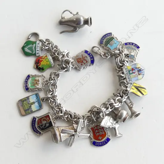 ASST. STG SILVER CHARMS, 34.5gms