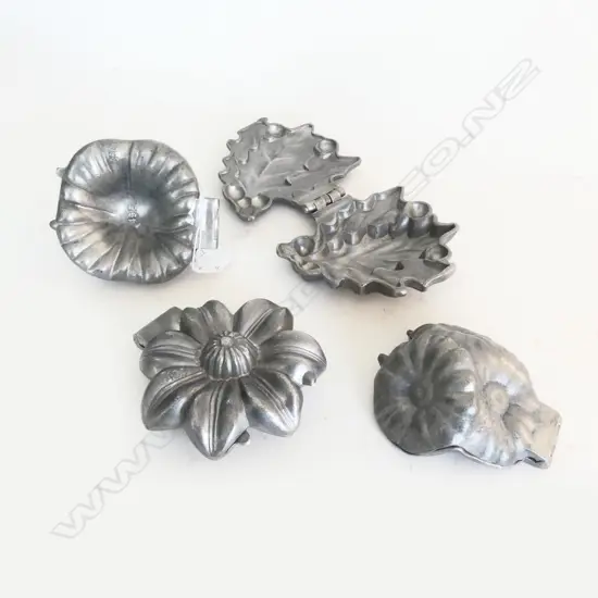 4 VINTAGE PEWTER ICE CREAM MOULDS; POPPY, DAISIES & POINSETTIA & HOLLY SPRAY