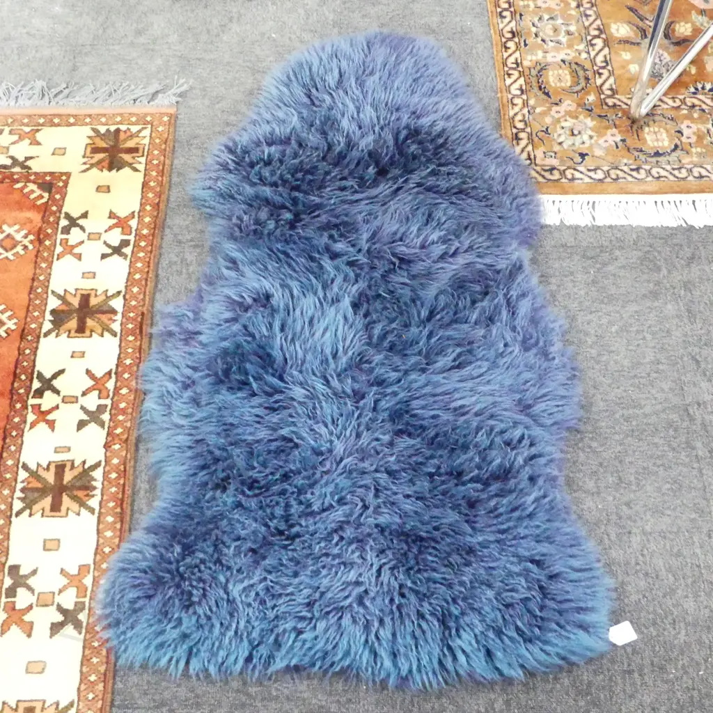 BLUE SHEEPSKIN RUG 1100x650mm Image 1++