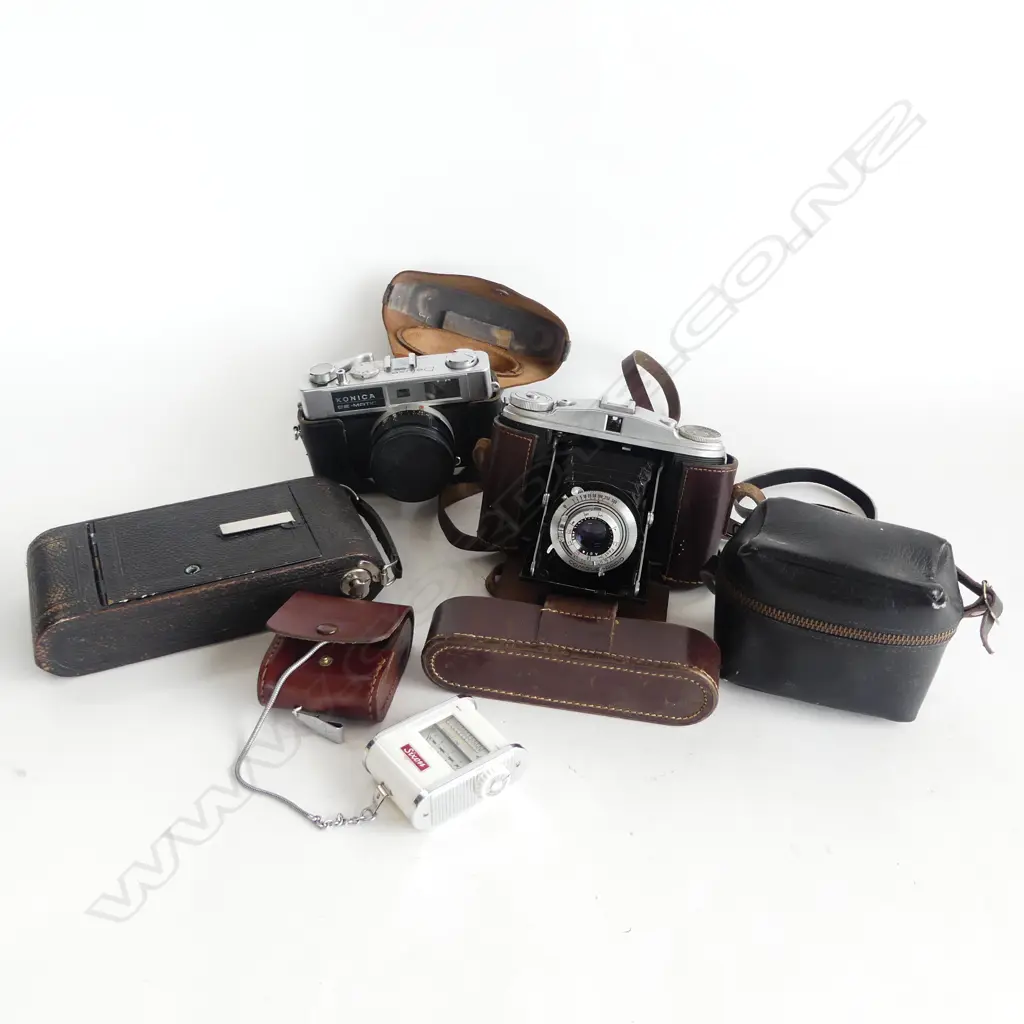 4 VINTAGE CAMERAS: Agfa Isoettek folding + Konica + Jhagee folding + Brownie Starlet Camera Image 1++