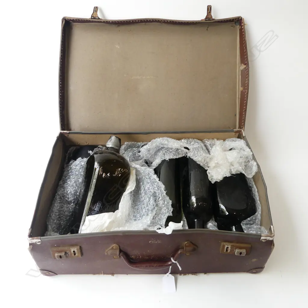 ASST. GREEN GLASS BOTTLES IN SUITCASE Image 1++