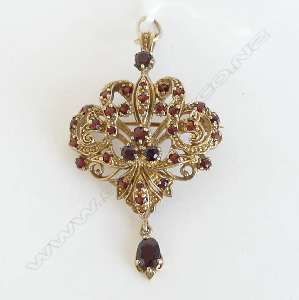 9ct YELLOW GOLD & GARNET PENDANT BROOCH 10.3gms scrolling forms with pendant drop Image 1++