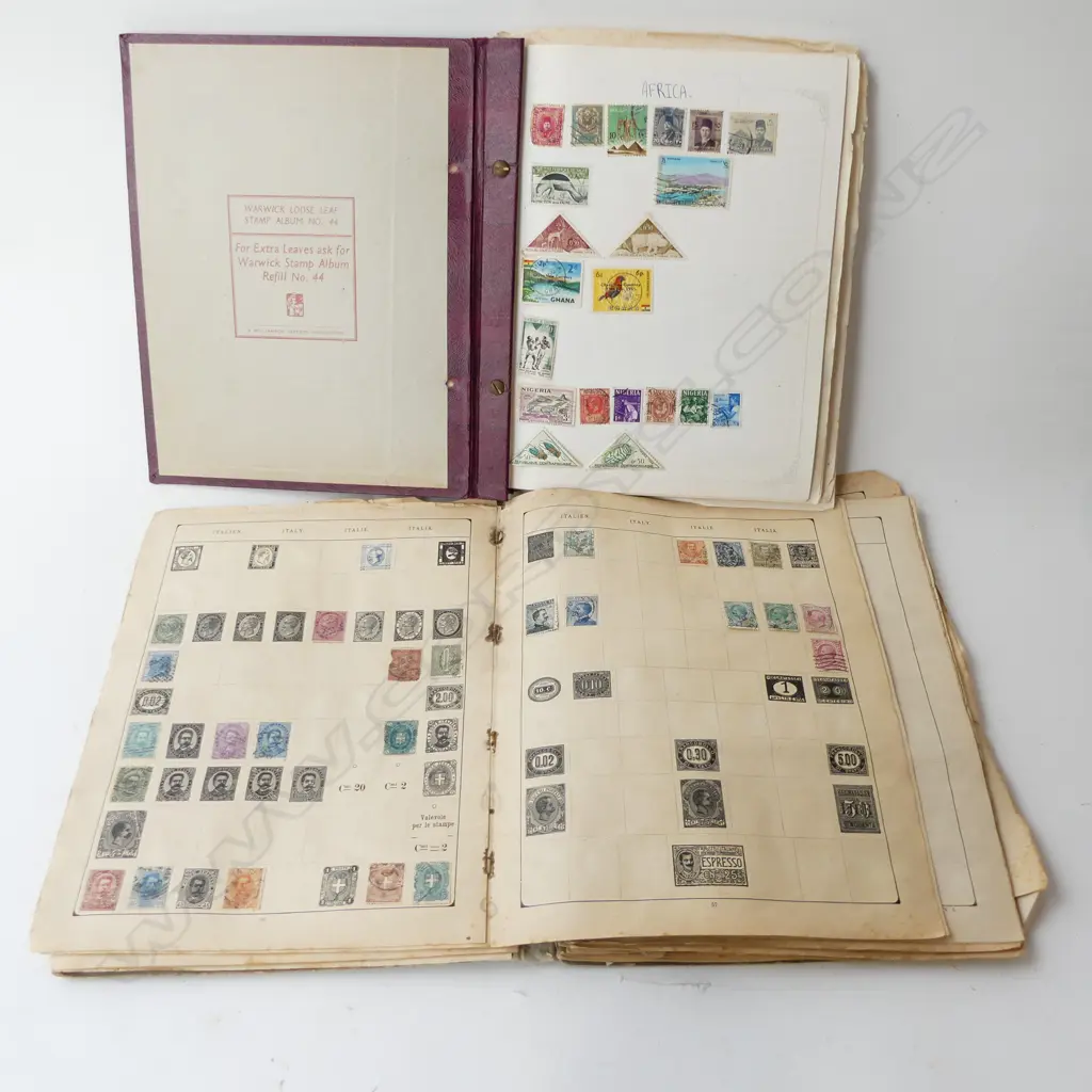 TWO VINTAGE STAMP ALBUMS Image 1++