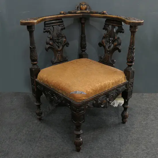 CARVED CORNER CHAIR slight damage to fabric