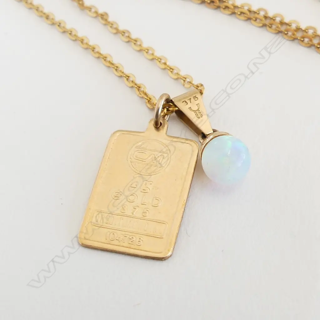 2 X 9ct YELLOW GOLD PENDANTS: opal & ingot approx 1.7gms. On plated chain Image 1++
