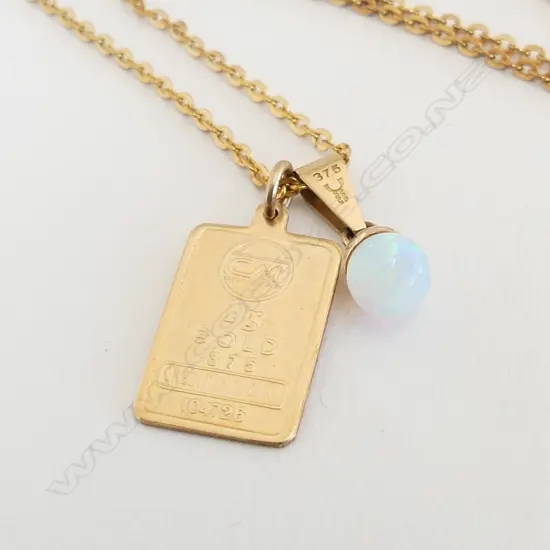 2 X 9ct YELLOW GOLD PENDANTS: opal & ingot approx 1.7gms. On plated chain
