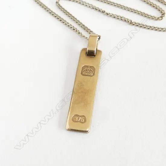 9CT PENDANT 2.8gms ON STG CHAIN 2.3gms