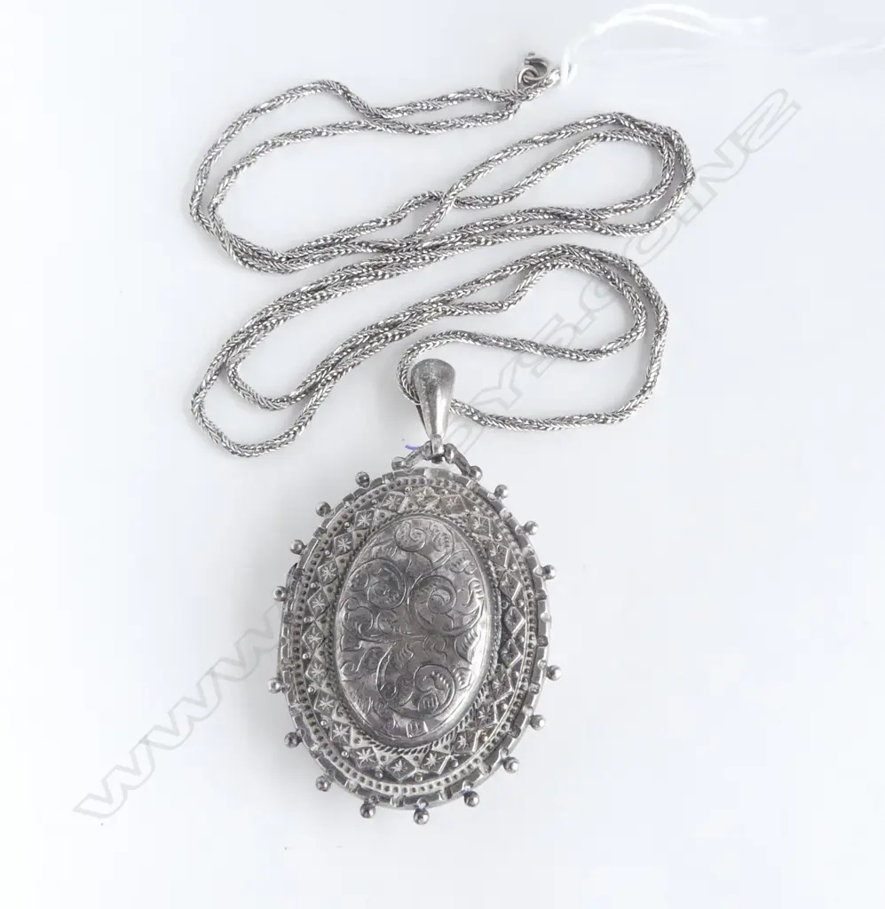 EDWARDIAN SILVER LGE FANCY LOCKET on later chain (dents to locket) Image 1++